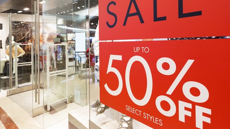 Retailers store window sale sign